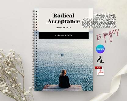 a spiral notebook with a picture of a woman sitting on a dock